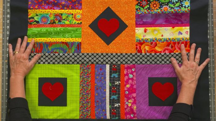 Bright quilt with heart shapes