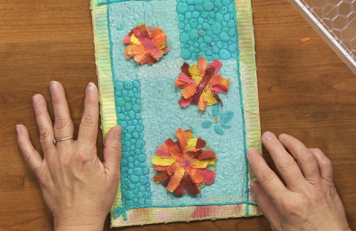 Quilted flower embellishments from fabric strips