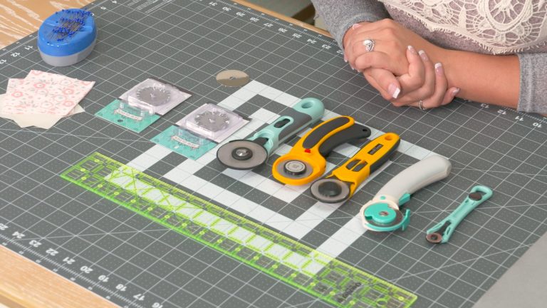 types of rotary cutters laid out on mat