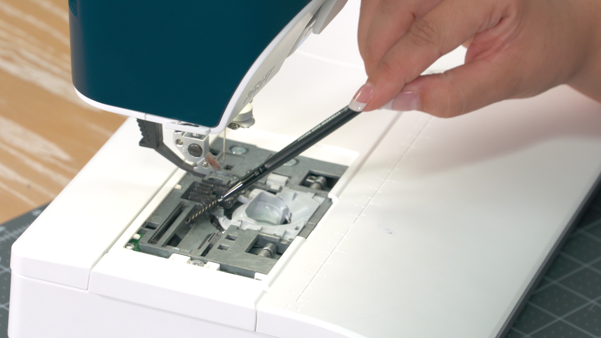 Cleaning a sewing machine