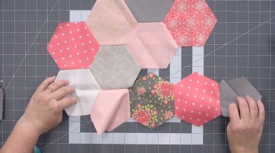 Pink and grey shades hexagon fabric piecing