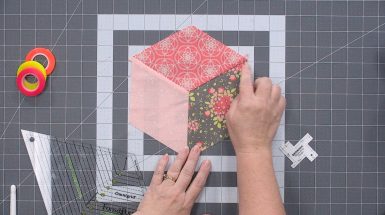 Piecing together pink fabric