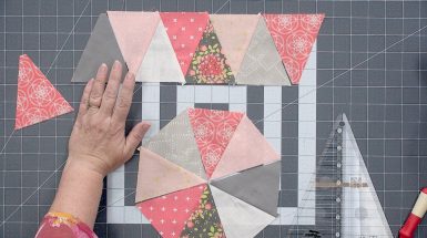Pink and grey fabric triangle quilting