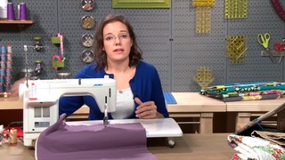 Woman sewing with a sewing machine