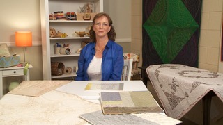 Woman at a quilting table