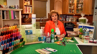 Woman with supplies at a quilting table