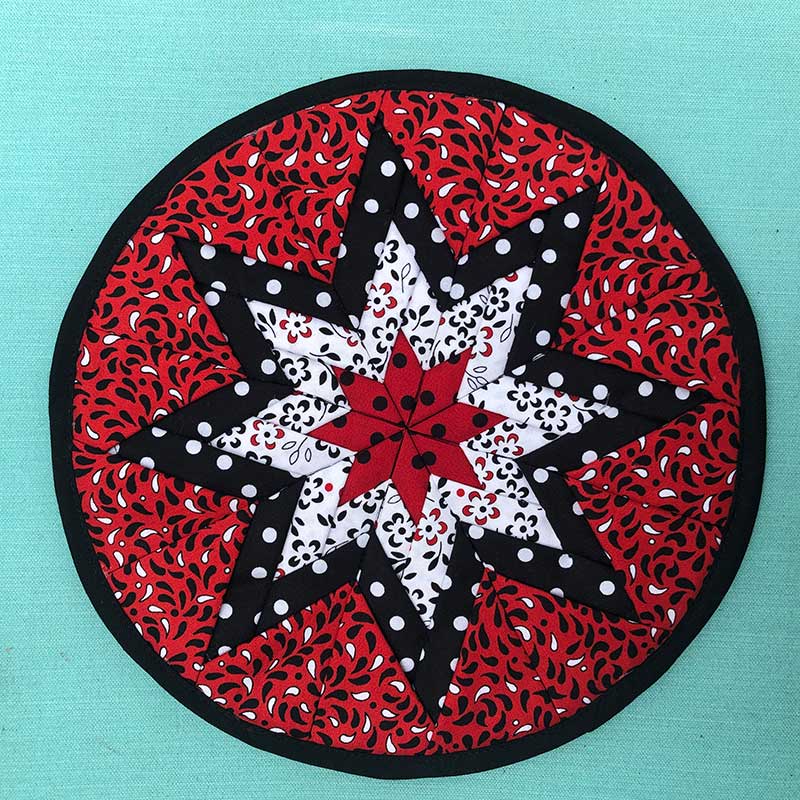 black white and red star quilt piece