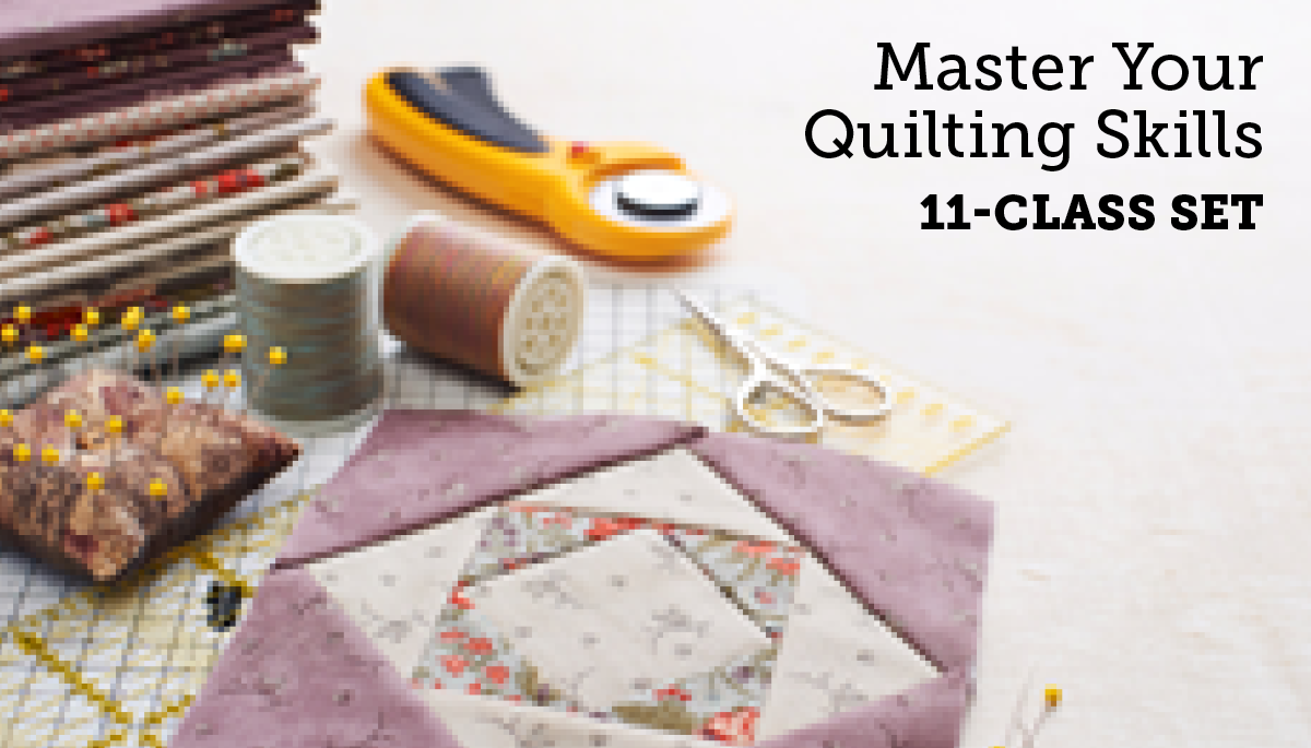 Quilt square with quilting accessors and Master Your Quilting Skills text