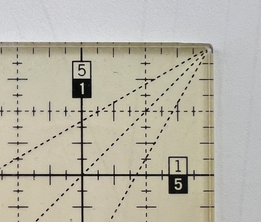 Corner of a quilting ruler showing limited fractions