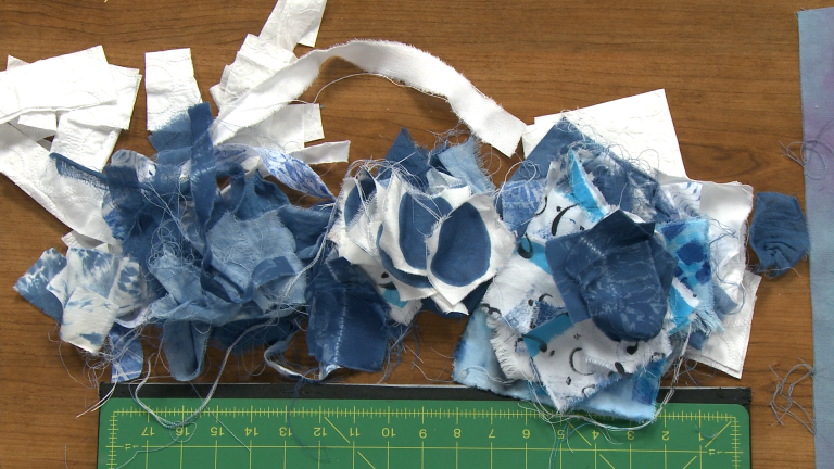 Blue and white fabric scraps