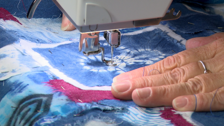 Quilting on blue fabric