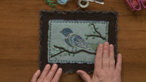 Embroidered bird quilt fabric