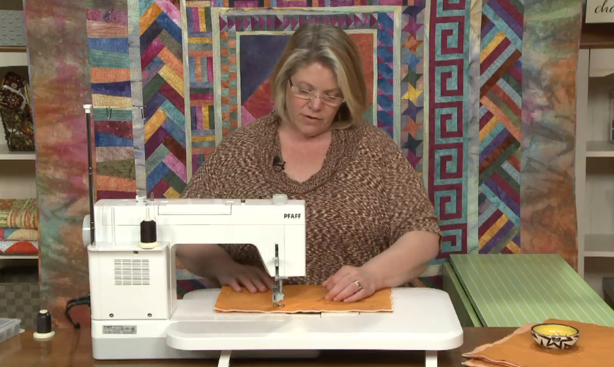 Woman using a sewing machine