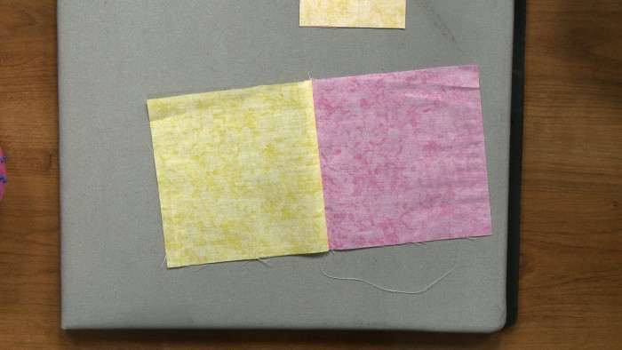 Yellow and pink fabric squares