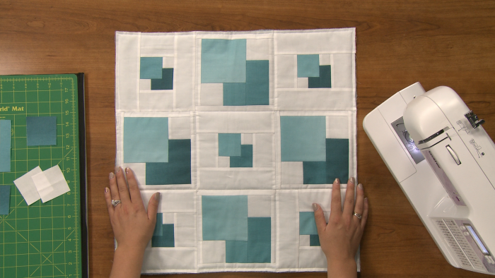 Quilt with shades of blue squares