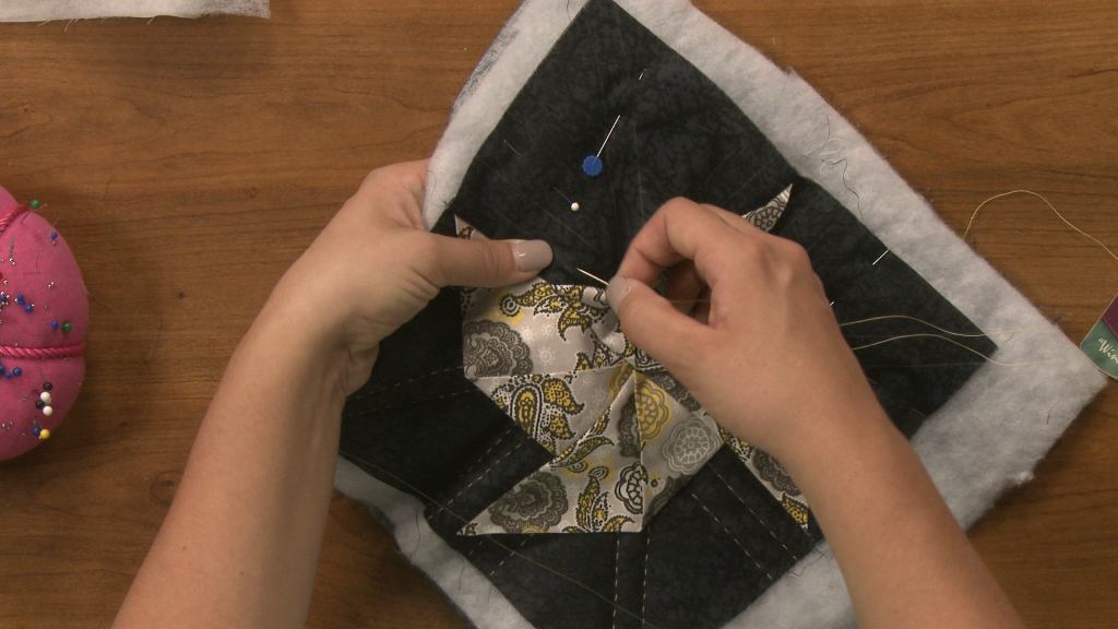 Sewing a 3D pinwheel on a quilt square