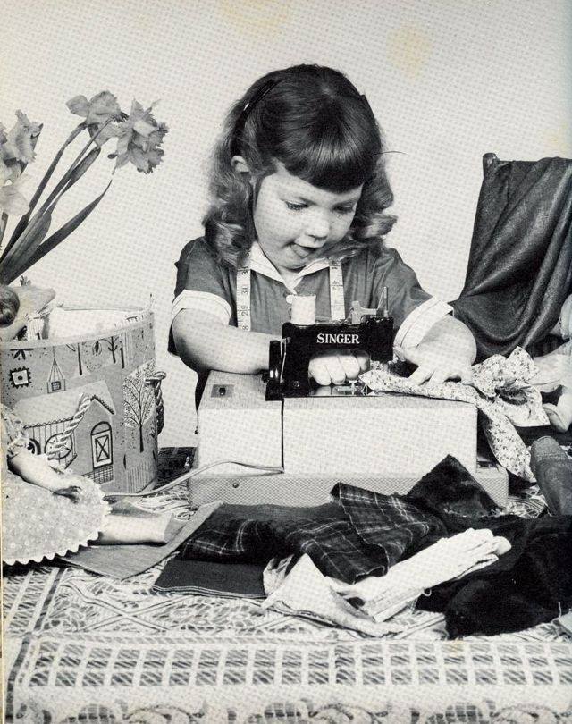 Black and white image of girl quilting