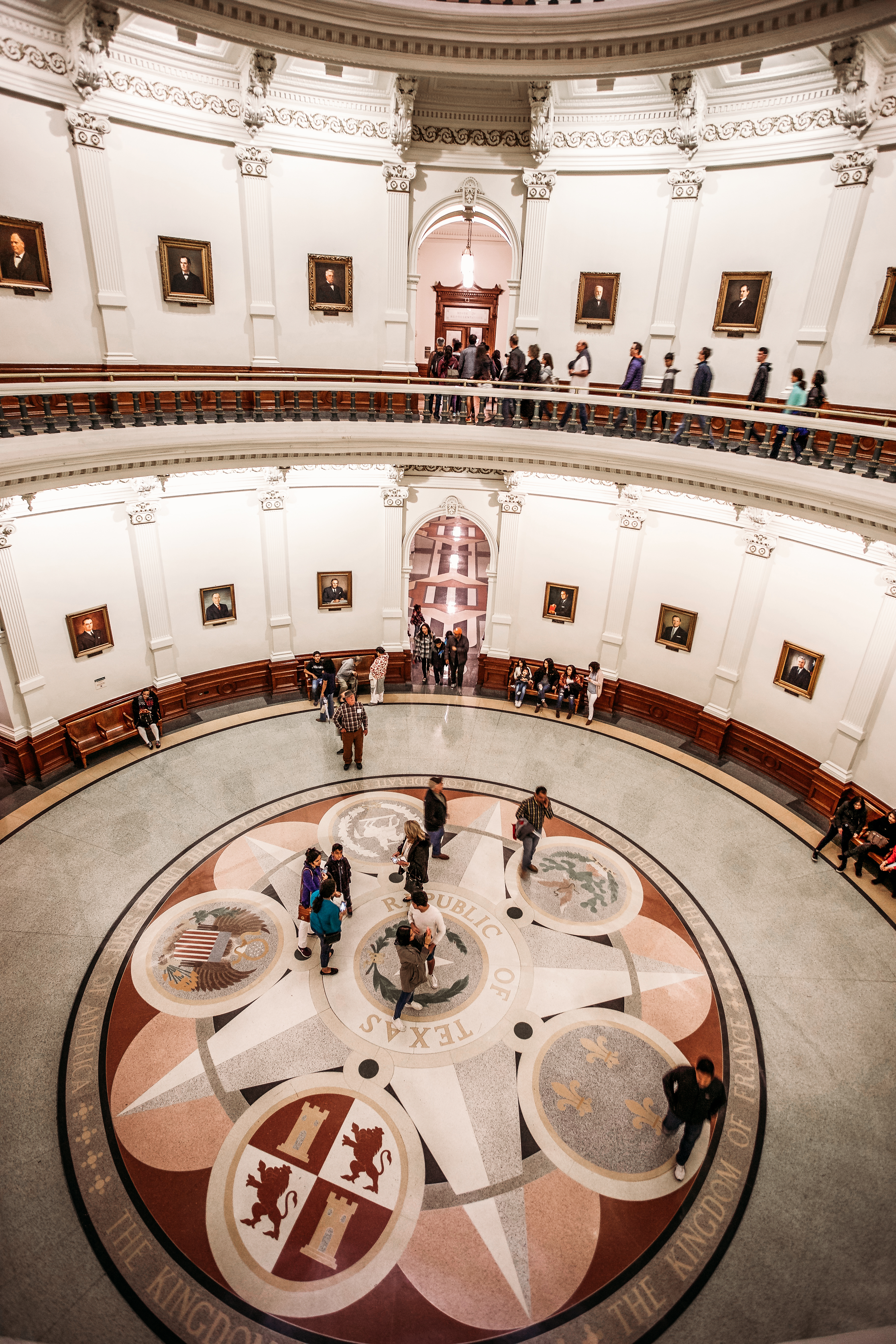 People in side a round room