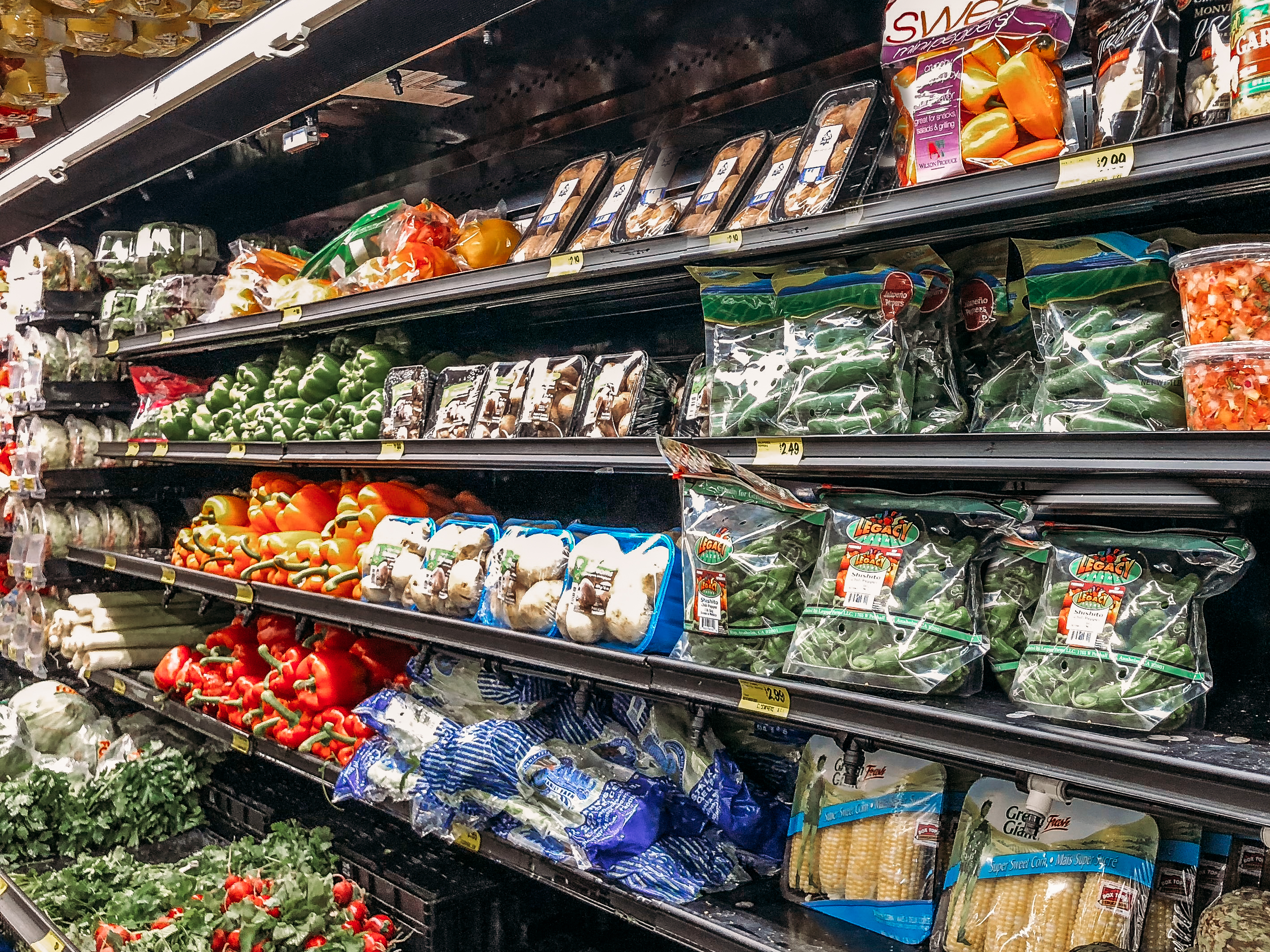 Produce shelf in a grocery store