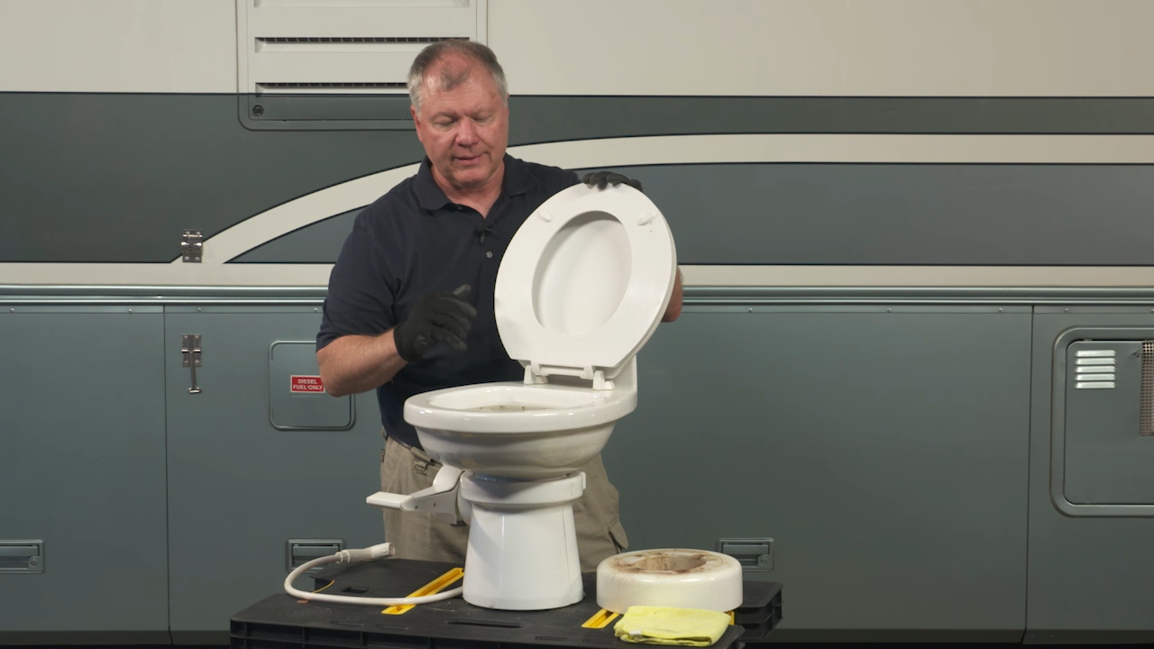 Man with an RV toilet