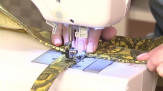 Sewing the handle on a bag