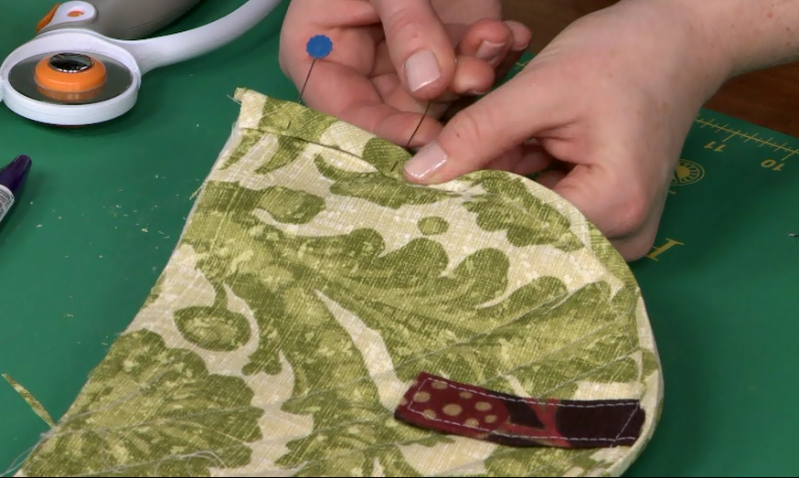 Pinning the edges of fabric
