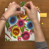 Adding a strap to a floral pattern wallet