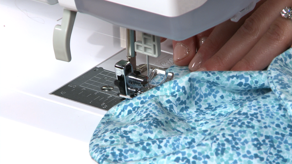 Sewing blue fabric
