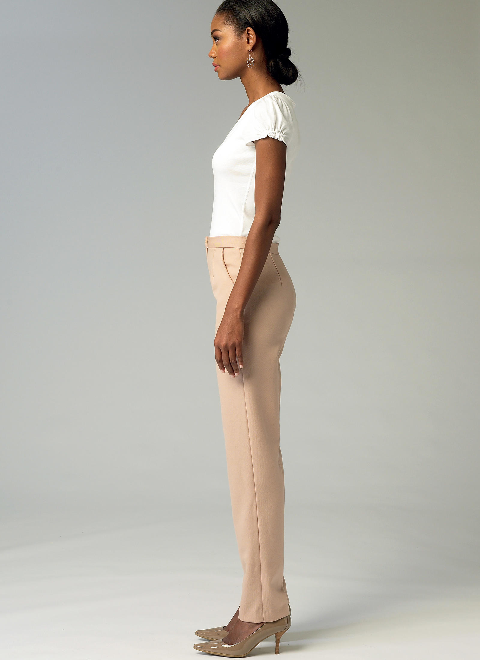 Side view of a woman in tapered pants