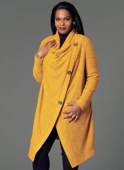 Woman modeling a long yellow cardigan