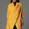 Woman modeling a long yellow sweater