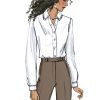 Drawing of a woman in a white button down collared shirt