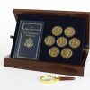 Propped open coin collection and book