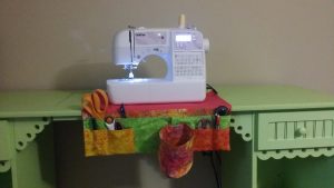 Sewing machine on a sewing machine mat