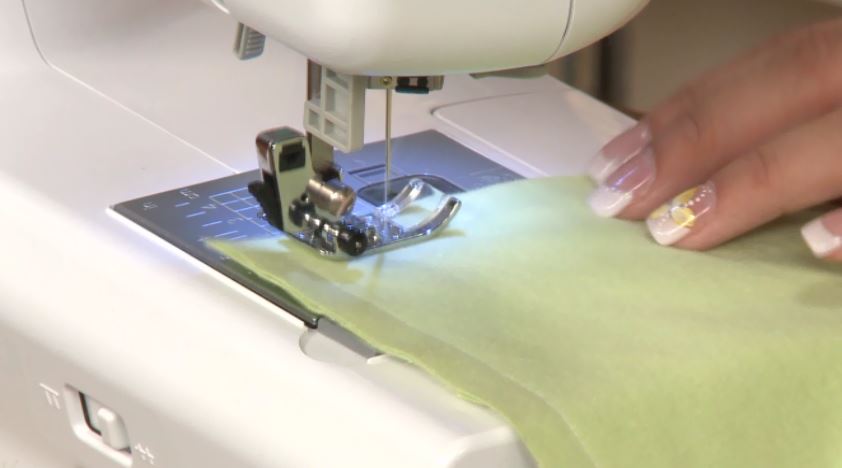 Sewing green fleece fabric