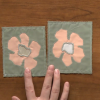 Two flower applique squares