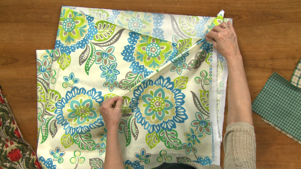 Working with blue and green flowered fabric