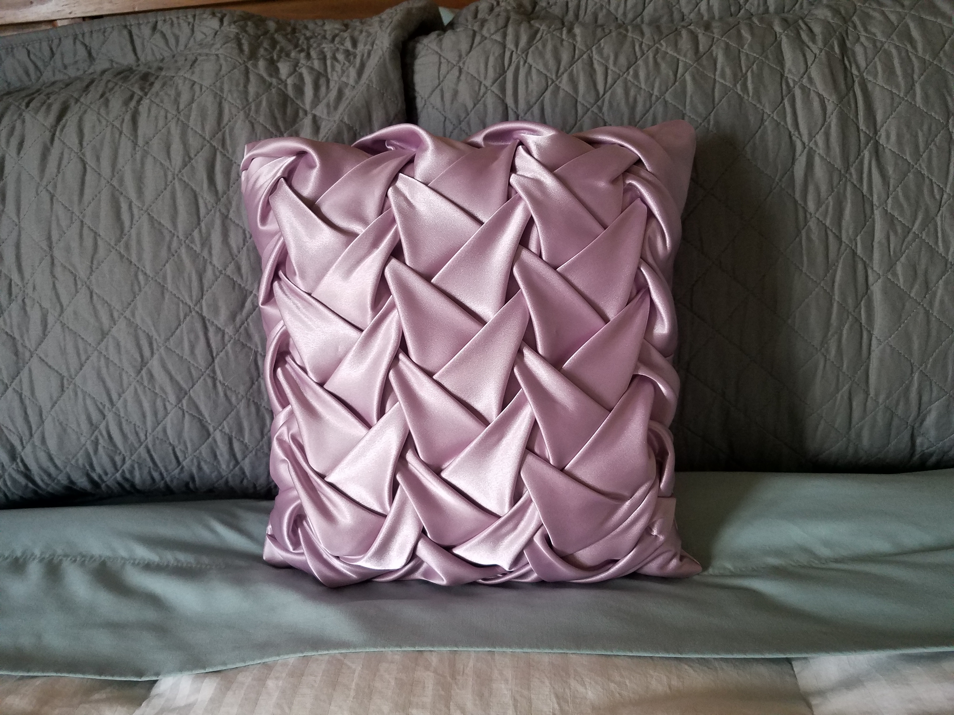 Pink smocked pillow