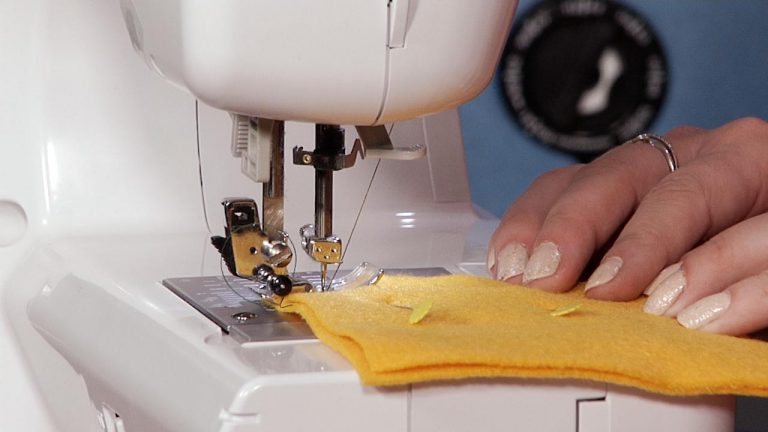 Sewing with yellow felt