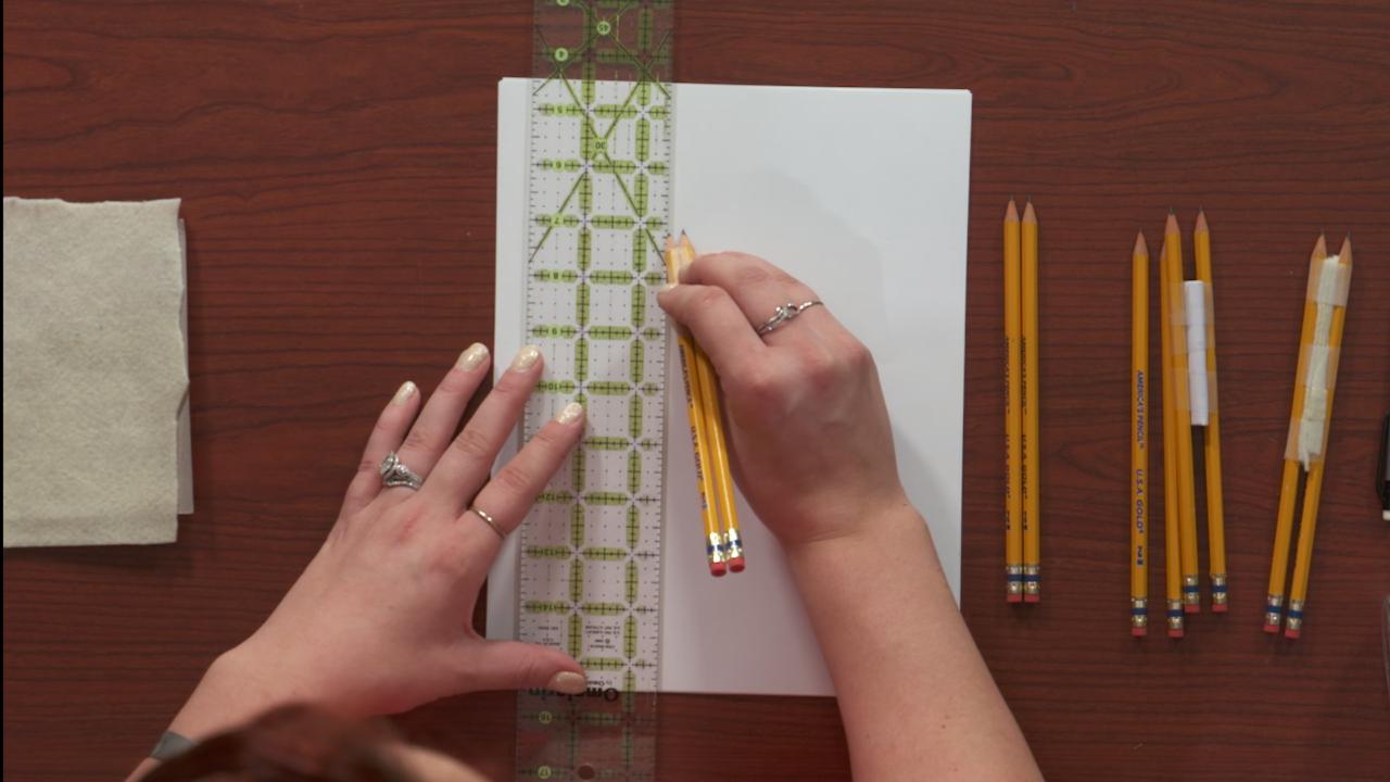 Drawing a line with a ruler