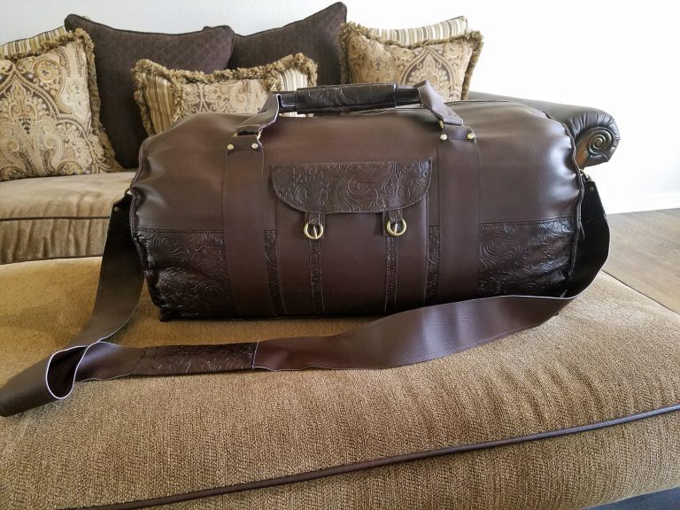 Large round duffle bag with a strap