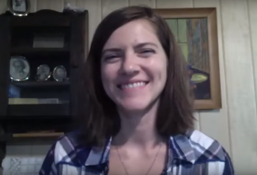 Screen shot of a woman smiling