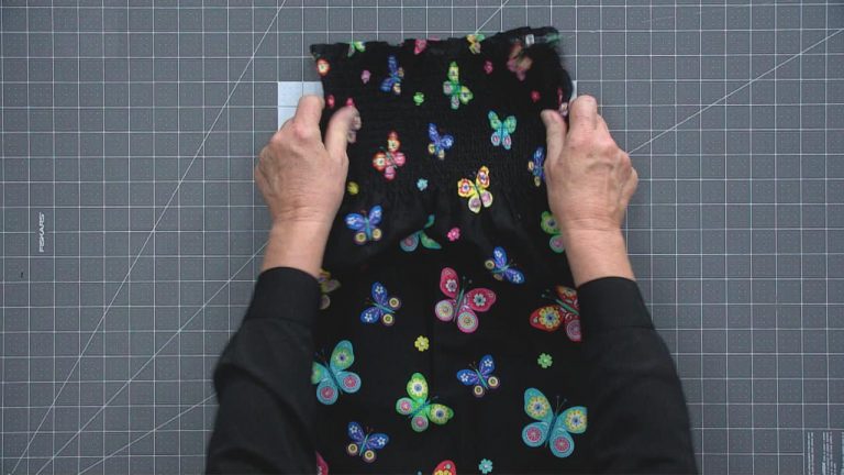 Person with butterfly fabric