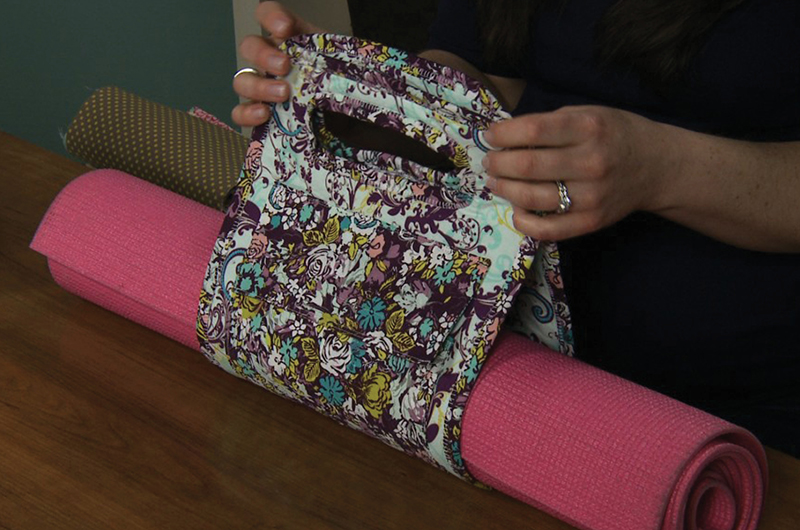 Yoga mat carrying handle