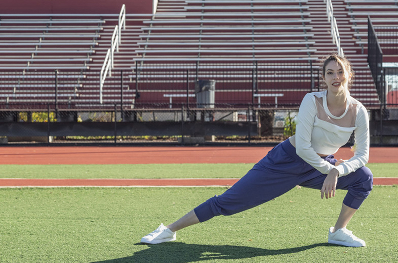 Woman doing a side lunge