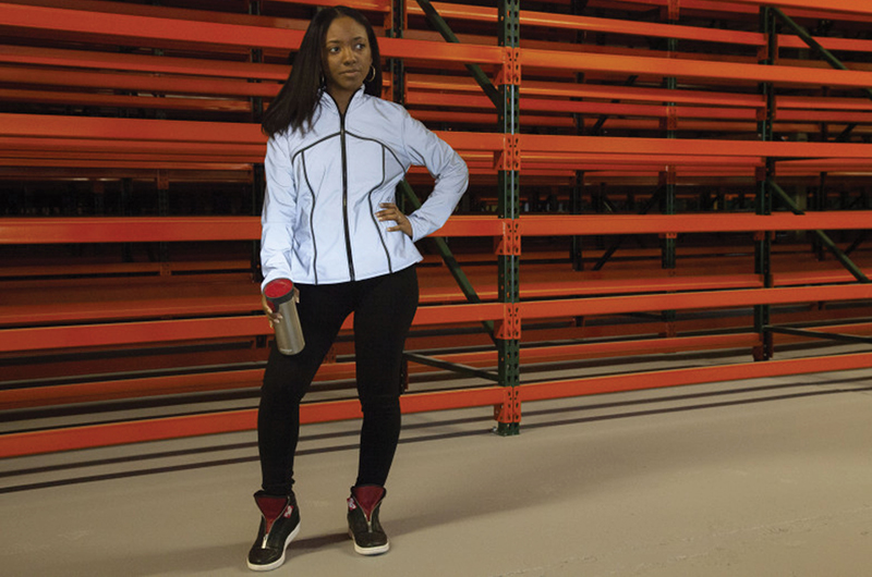 Woman posing in workout gear