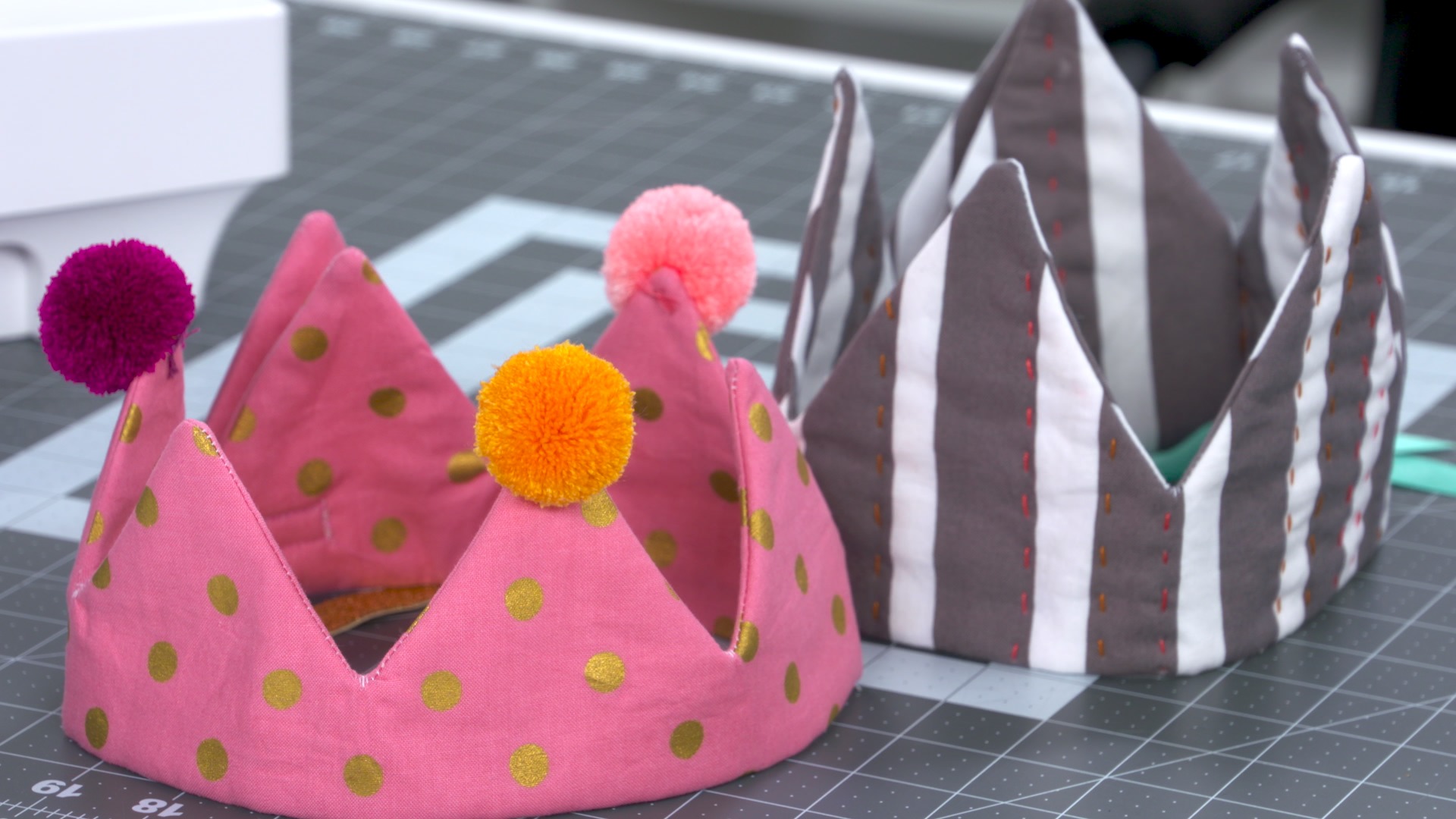 Sewing instructor shows how to sew a pink and striped crown for birthdays and other occasions