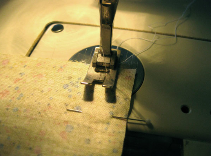 sewing pinned fabric