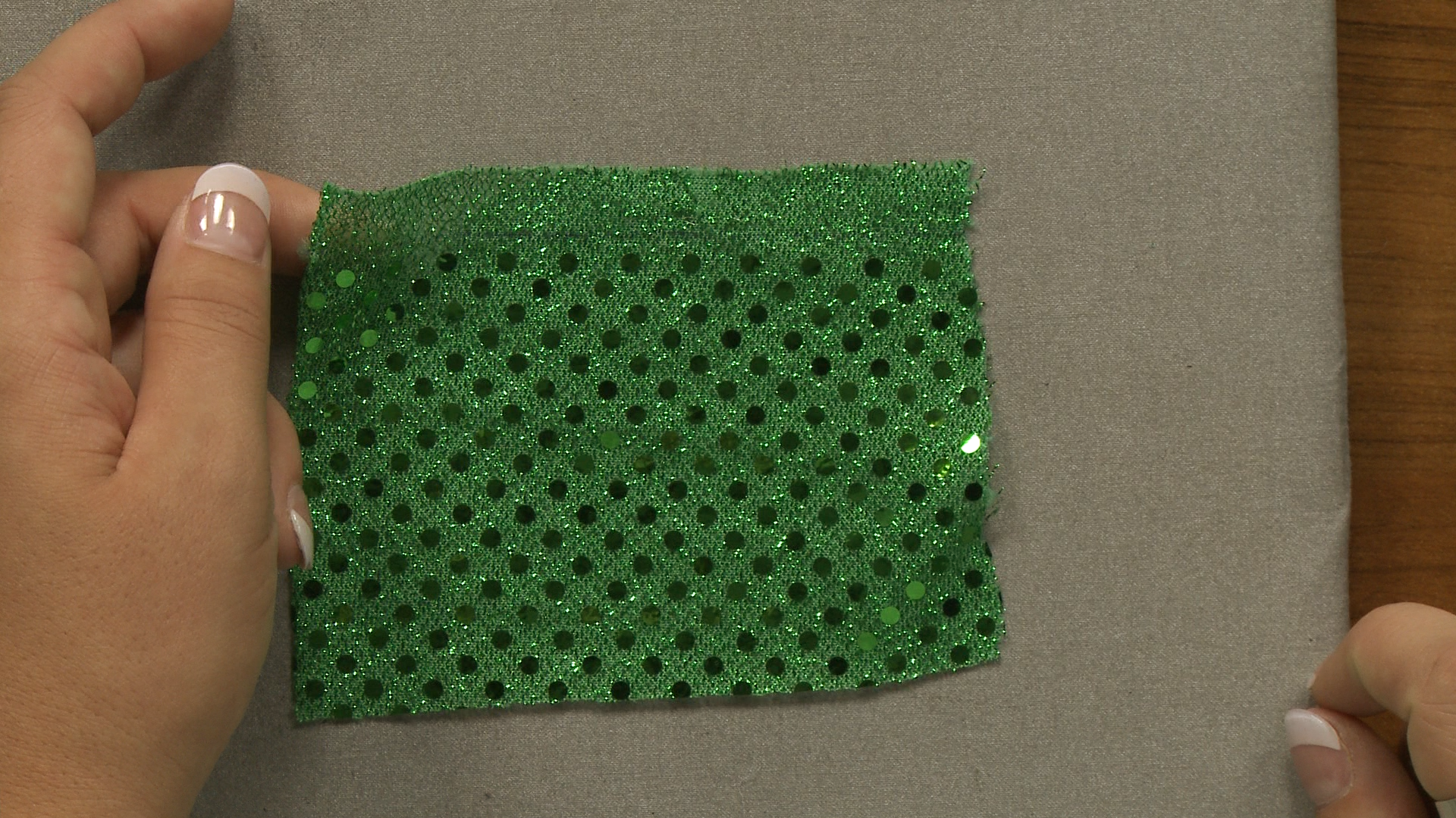 Green sequined fabric