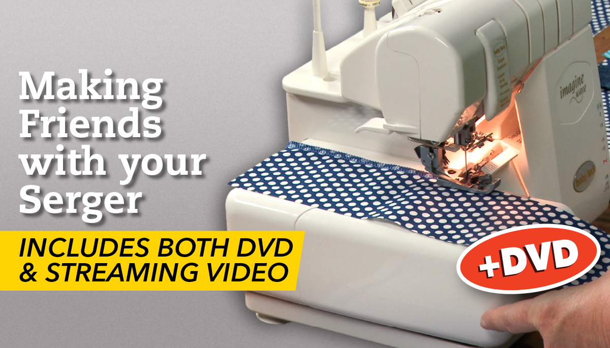 Sewing blue fabric with white polka dots